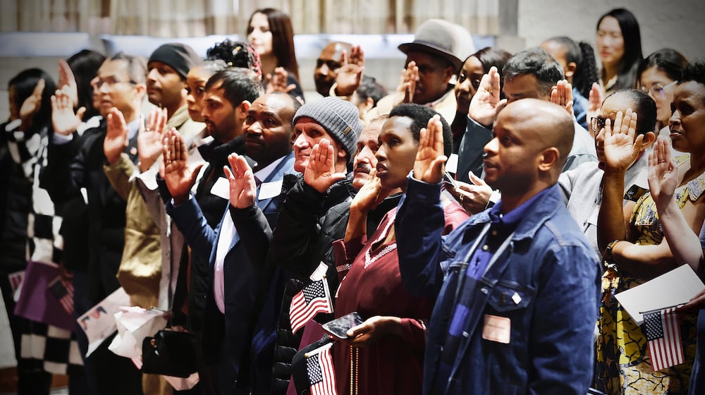 A naturalization ceremony was held Thursday, Jan. 23, 2025, at Oakwood High School School, during which 38 people from 22 different countries became U.S. citizens. MARSHALL GORBY\STAFF